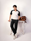 BLACK REGLAN POCKET POLO